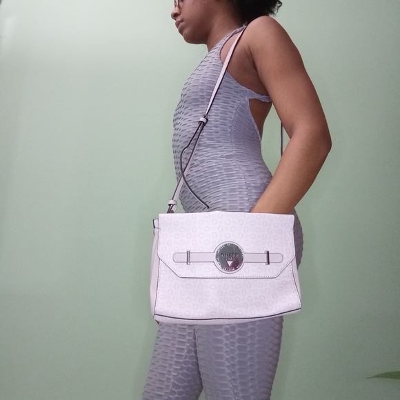 Guess Handbags - Women's soft pink guess monogrammed crossbody bag